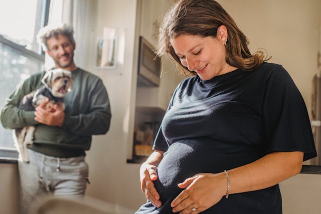 A pregnant woman symbolizing the importance of planning ahead with Toronto whole life insurance for her growing family's financial security.