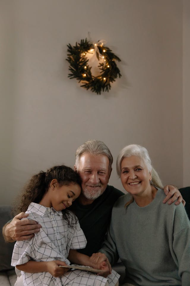 Grandparents enjoying time with their granddaughter, showcasing the importance of segregated funds, annuities, and retirement planning in Toronto and surrounding areas.