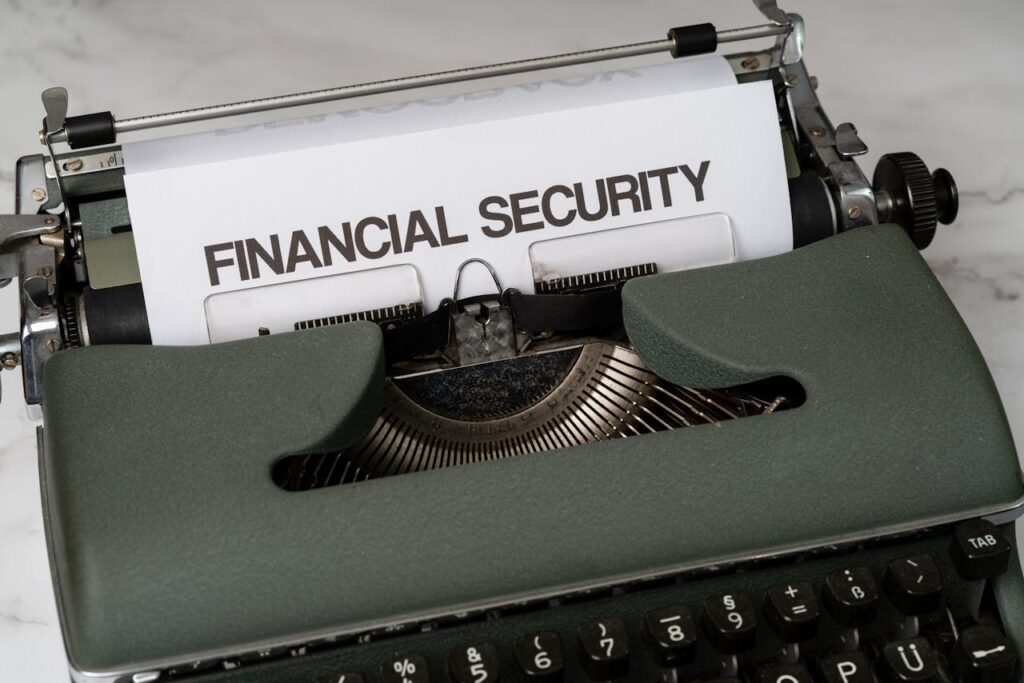 Image of a typewriter with the words "Financial Security" typed on a sheet of paper. The image represents the importance of "retirement planning with annuities and segregated funds" for securing financial stability. Servicing Toronto and surrounding areas.