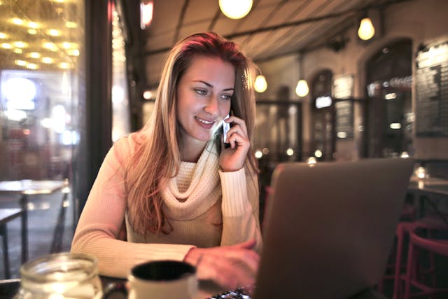 A young mother applying online for affordable and easy term life insurance for young families in Toronto