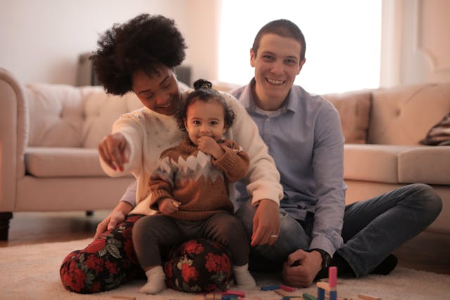 A happy young family enjoying a day in Toronto, showcasing affordable and easy term life insurance for young families in Toronto."